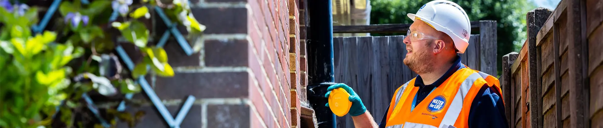 southern water blockages team visiting a customer